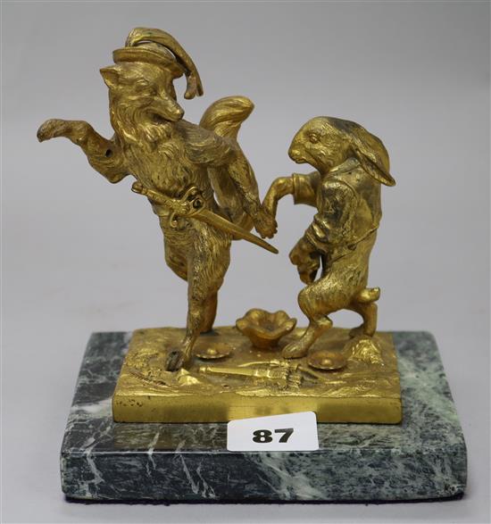A 19th century French ormolu paperweight modelled with the fox and the hare H.15cm.